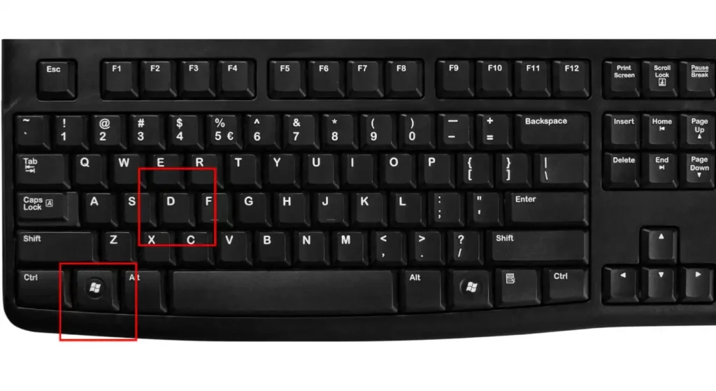 キーボード上のWindowsキー、D
キーが明るく強調表示されている画像。